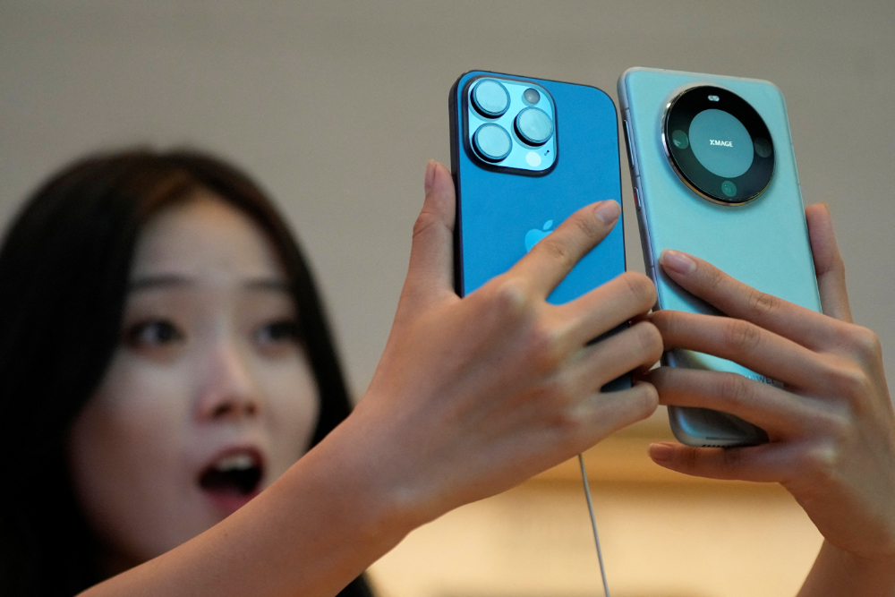 Doanh số iPhone gây thất vọng, Huawei và Xiaomi đón tin vui - 2 12