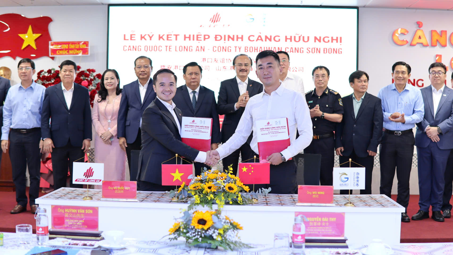 Cảng quốc tế Long An ký hợp tác với Cụm cảng Sơn Đông Trung Quốc và hãng tàu của Singapore mở rộng mạng lưới logistics - Nghi thuc ky ket Hiep dinh cang Huu nghi giua Cang Quoc te Long An va SPG Bohaiwan Por